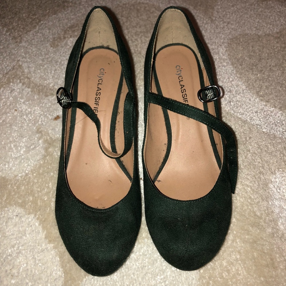 Green suede pumps